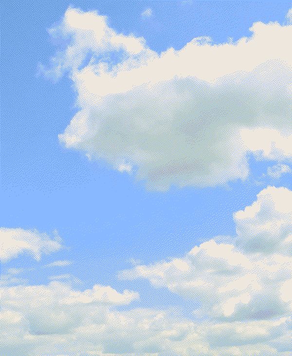 Blue sky with white fluffy clouds.